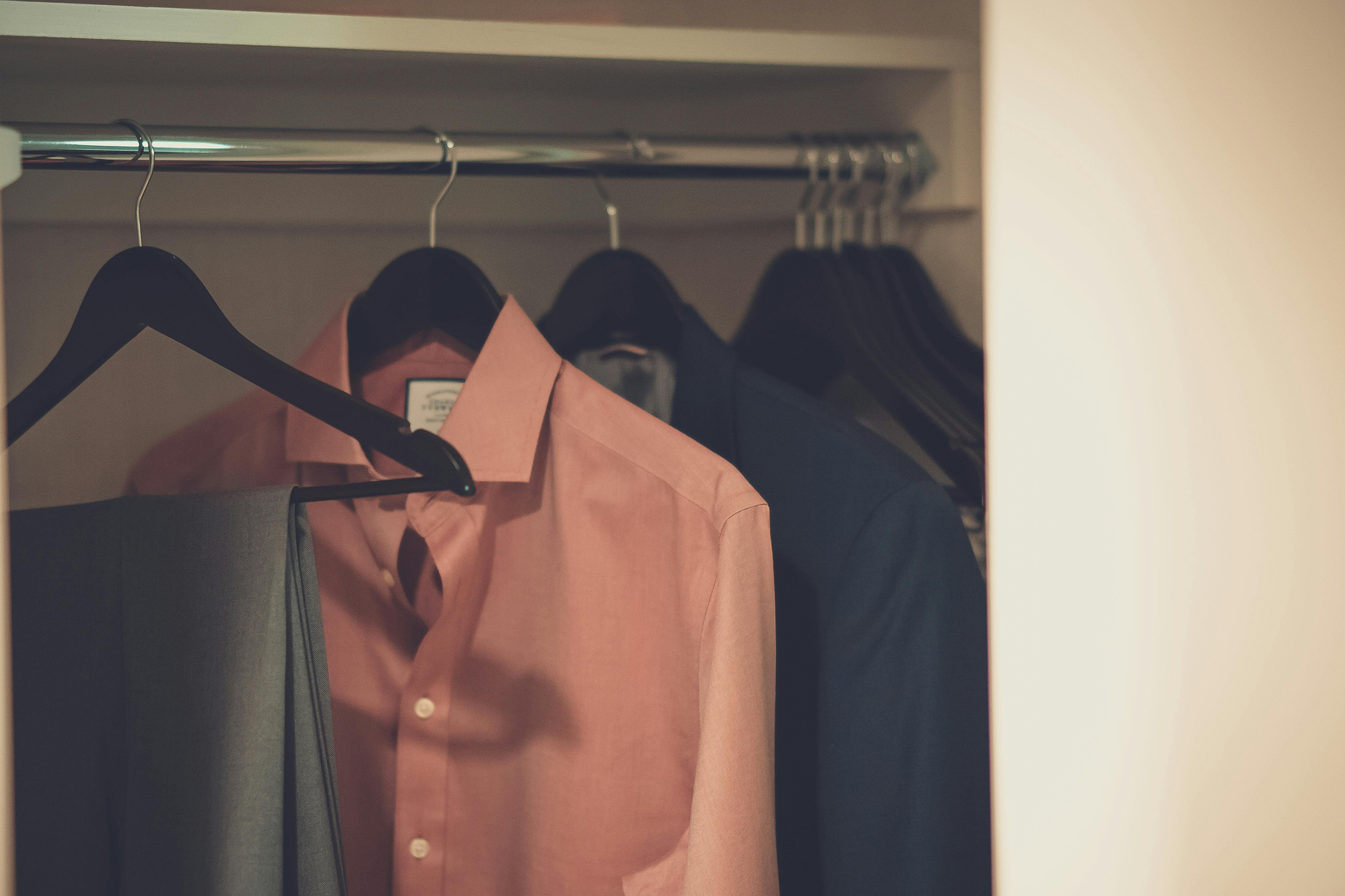 open wardrobe with shirts